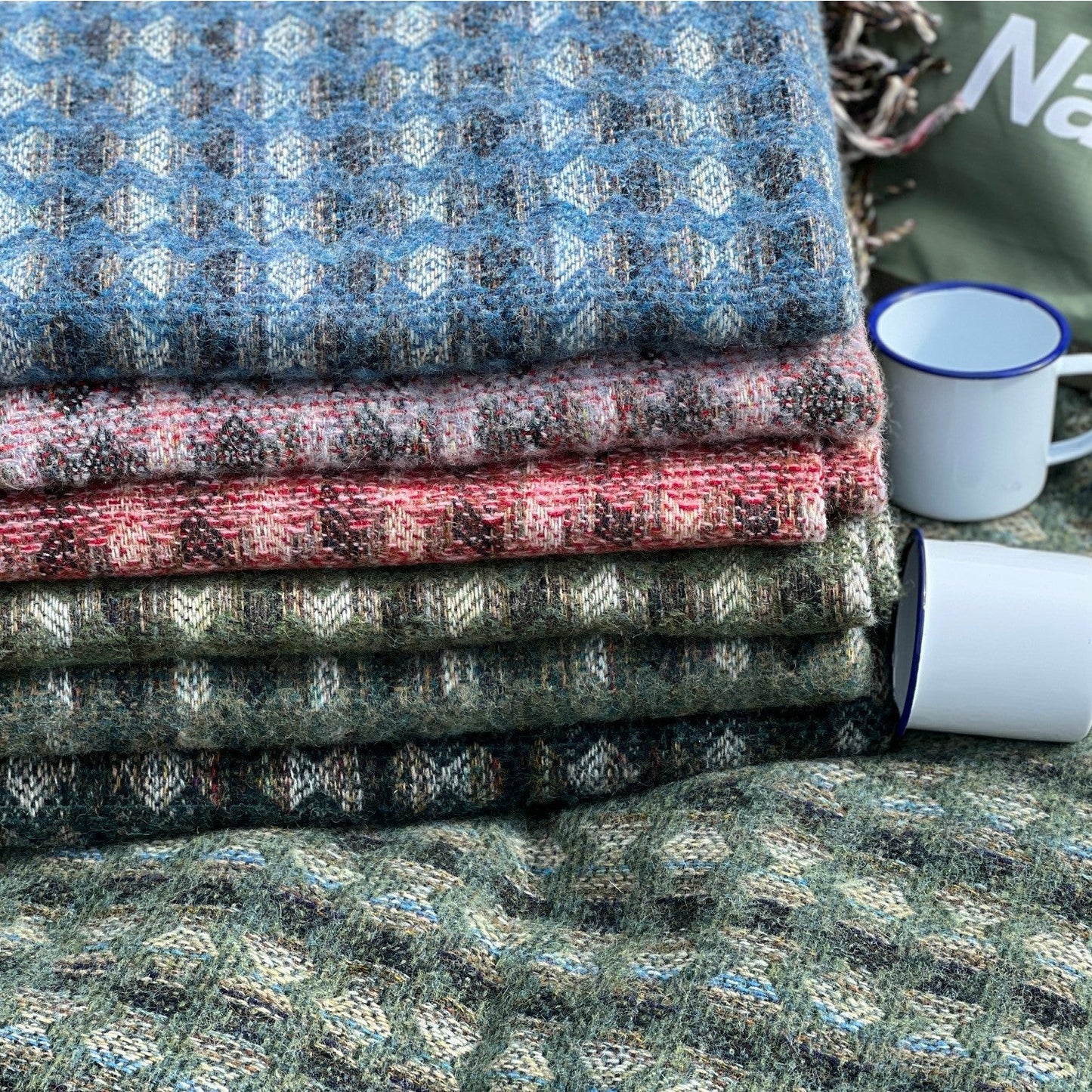 Pure wool blanket made in Selkirk, Scotland.  Ideal for picnics, beach days, long nights by the fire or camping.